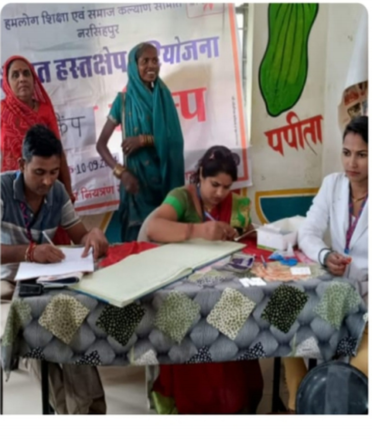 The consultation team working with community members at the health camp.